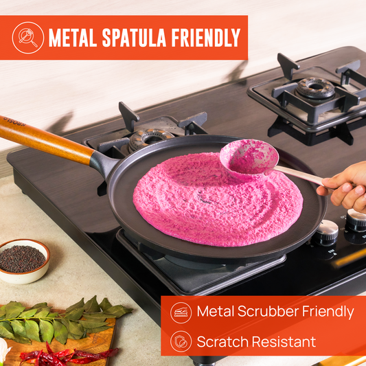 Metal ladle used in Kroslo cast iron cookware — metal spatula and scrubber safe